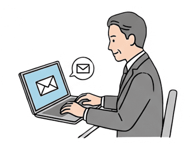 パソコンでメールを送信する50代上司